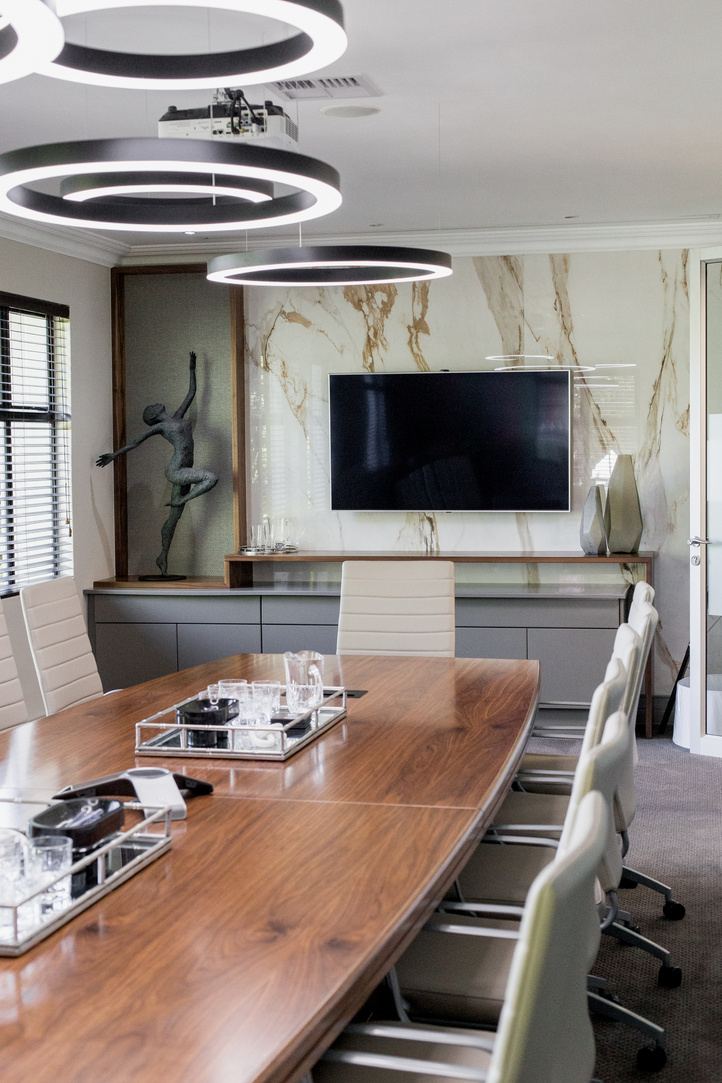 Boardroom with marble feature wall designed by Kirsty Badenhorst Interiors, South Africa